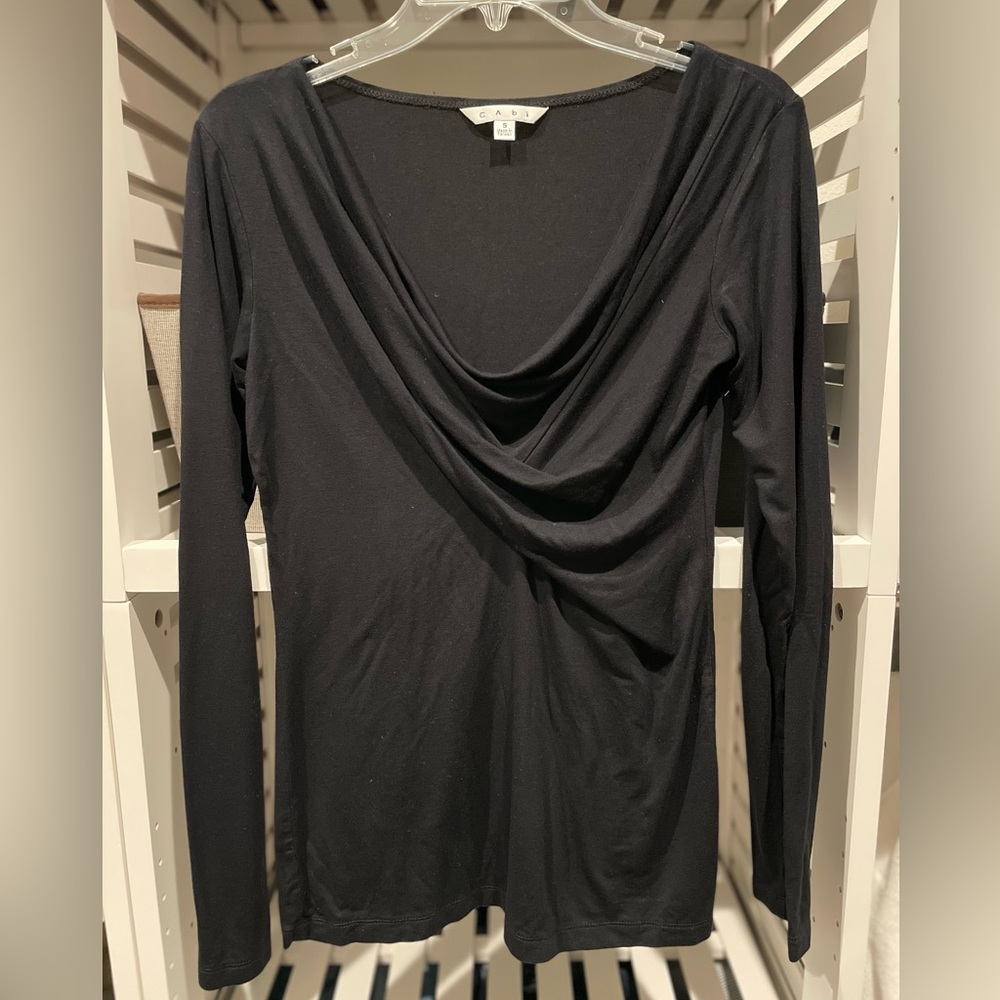 Cabi black long sleeve top with flattering neck detail. Size small.